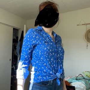 Blue shirt with daisies